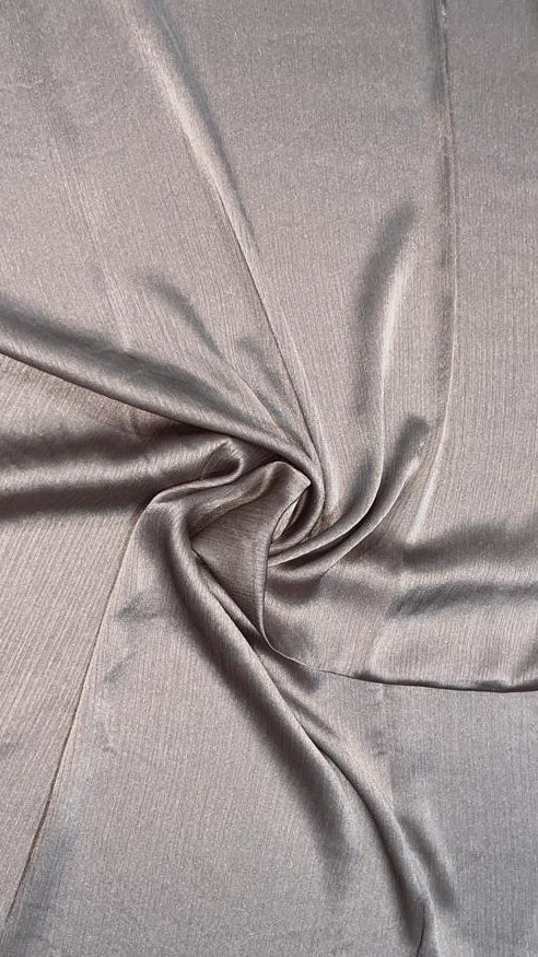 Shop the Crinkle silk satin hijab Copper by Mawdeest. Premium party wear hijab featuring luxurious satin silk texture, elegant shine, and graceful drape. Perfect for weddings, Eid, festive occasions, and special celebrations. Buy hijab online in India.
