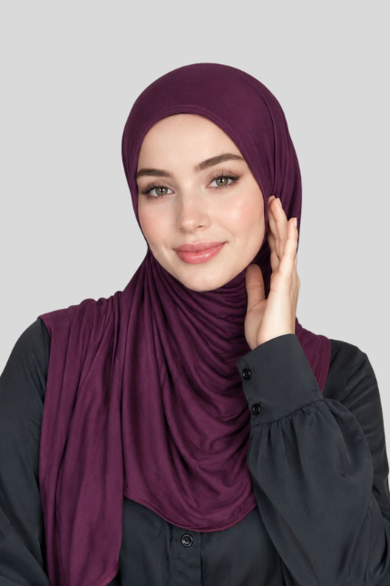Shop the Premium Jersey Hijab - Wineby Mawdeest. Premium party wear hijab featuring luxurious satin silk texture, elegant shine, and graceful drape. Perfect for weddings, Eid, festive occasions, and special celebrations. Buy hijab online in India.
